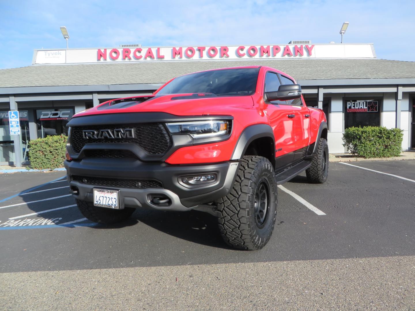 2023 Red /BLACK RAM 1500 Ram 1500 TRX Crew Cab 4x4 (1C6SRFU9XPN) with an 6.2L Supercharged HEMI V8 SRT engine, 8 Speed Auto 8HP95 transmission, located at 2630 Grass Valley Highway, Auburn, CA, 95603, (530) 508-5100, 38.937893, -121.095482 - Must see TRX featuring Eibach front and rear springs, 18" Method NV double black wheels, 37" Nitto Ridge Grappler tires, and window tint. - Photo#0